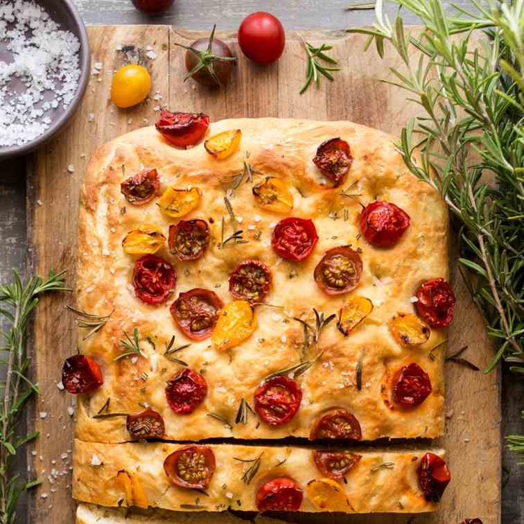 Vegan focaccia with tomatoes and rosemary