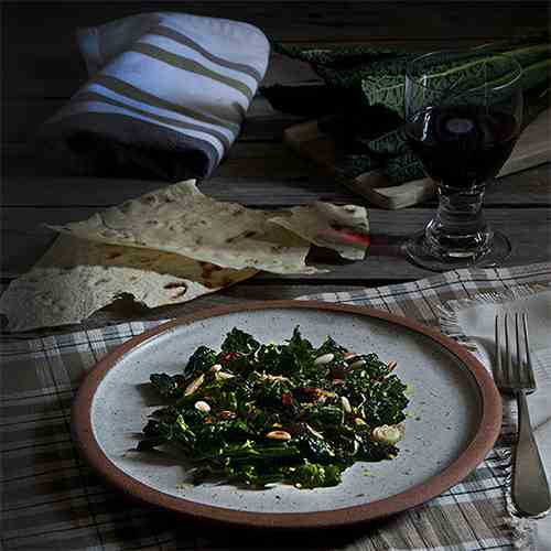 Italian kale with pine nuts and raisin