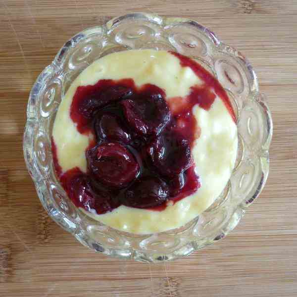 Vanilla-almond pudding with cherry compote