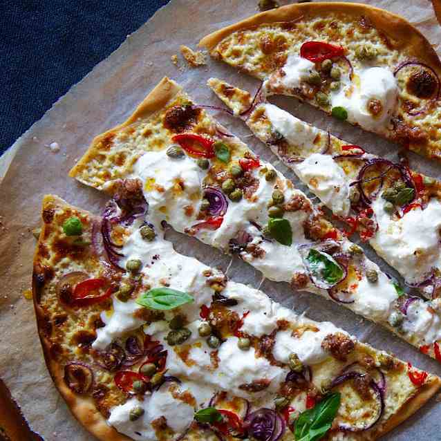 Flammkuchen with burrata and anchovy oil