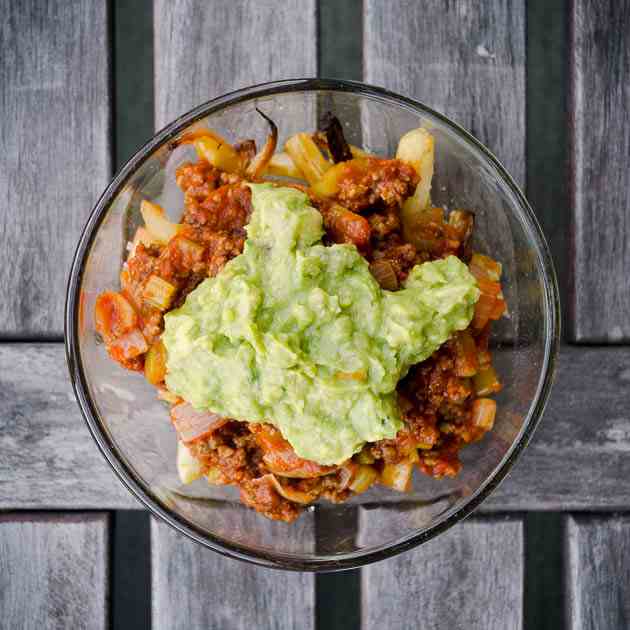 Chili and Guacamole Topped Parsnip Fries