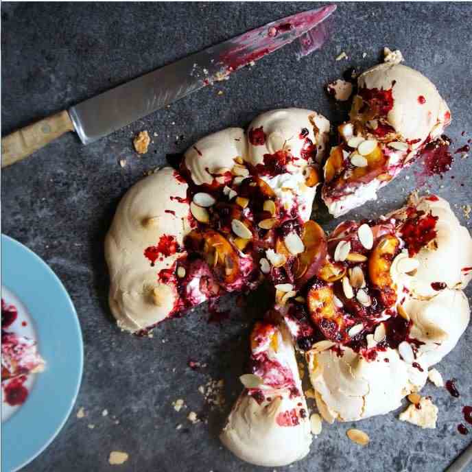 Peach and almond pavlova with berries