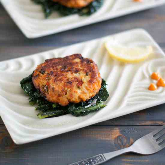 Salmon Cakes on a bed of sauteed Kale