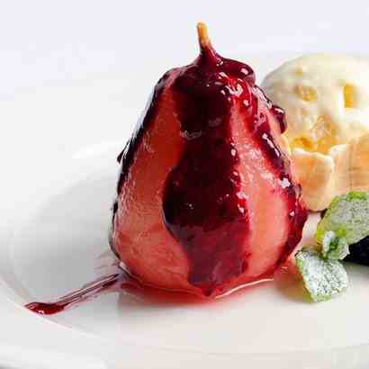 Stewed pear with berry coulis