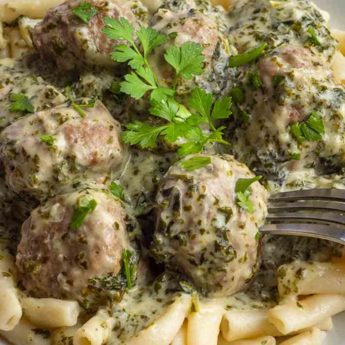 Meatball pasta in creamy green sauce