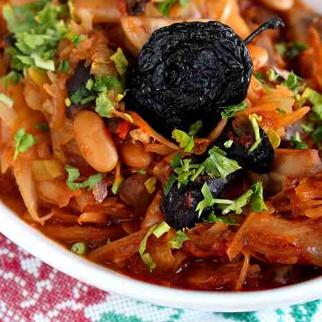 Cabbage stewed with mushrooms and prunes