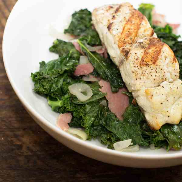 Grilled Bass over Kale and Prosciutto Sala
