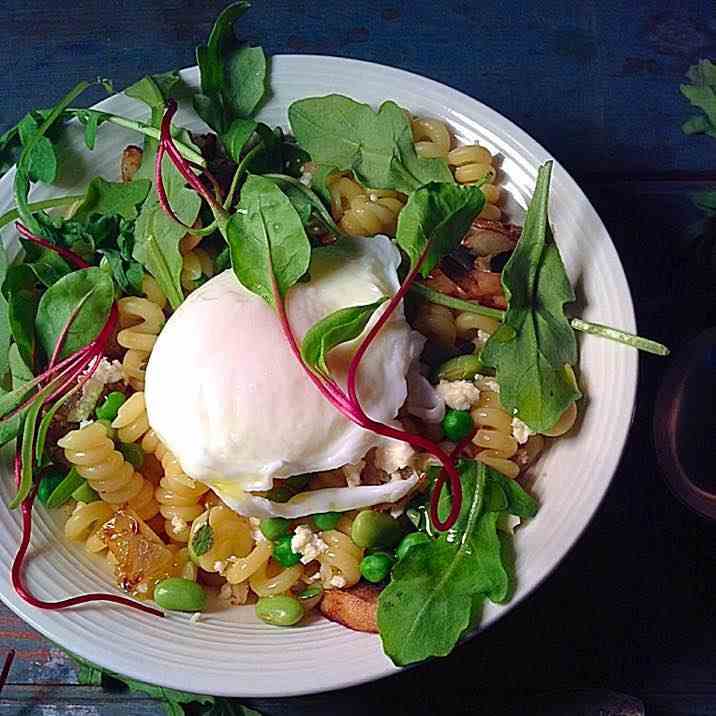 Poached egg and greens on fusilli