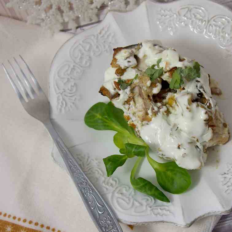 Carp baked with mushrooms