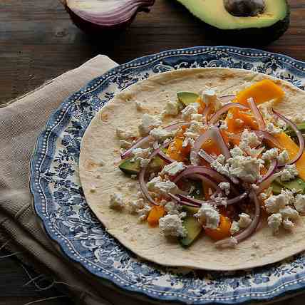 Wraps with avocado, mango and red onion