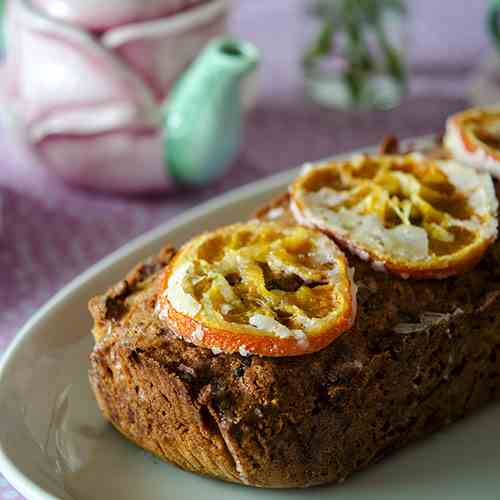 Rice flour plum cake with oranges