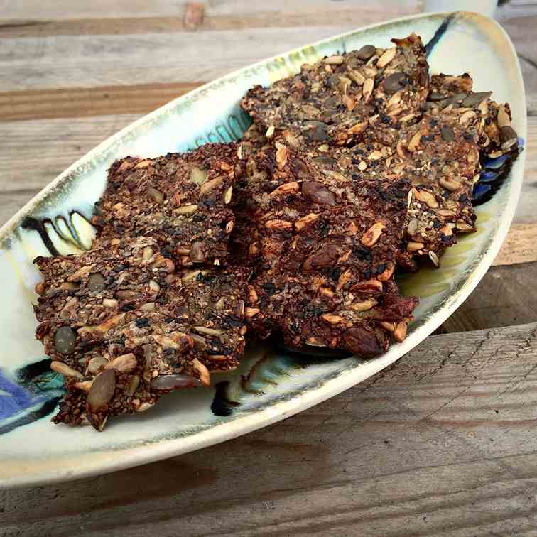Chia seed crackers with beetroot hummus