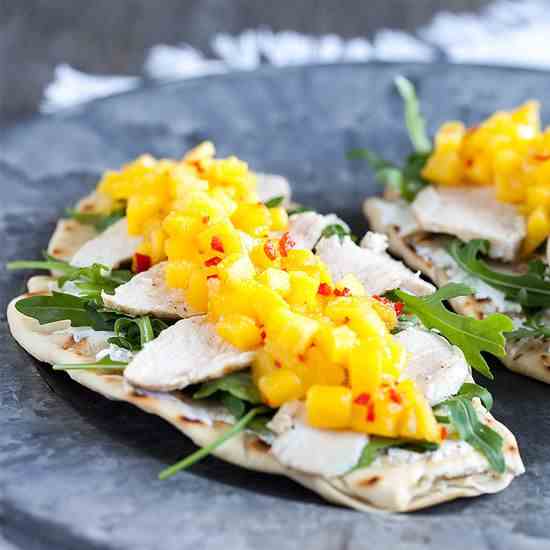 Mango and chicken with goat cheese on naan