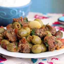 Garlic beef with olives