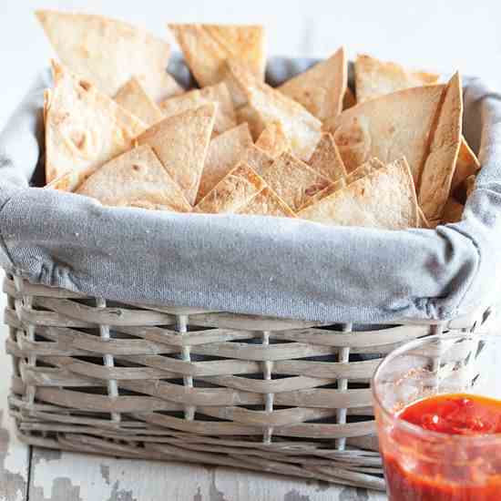 Tortilla chips with red pepper dip