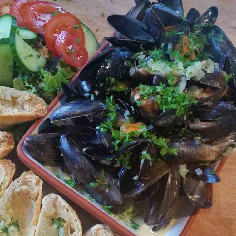Moules mariniere with garlic and parsley s