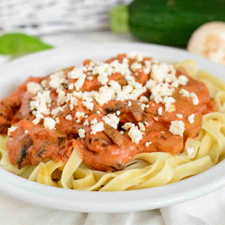 Tomato pasta with zucchini and mushroom