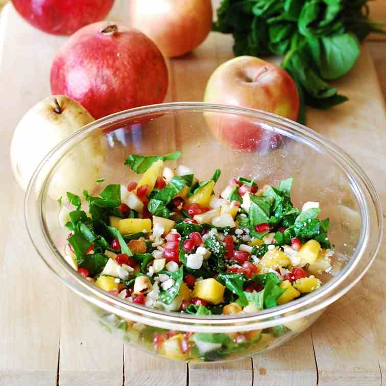 Chopped salad with spinach, pomegranates