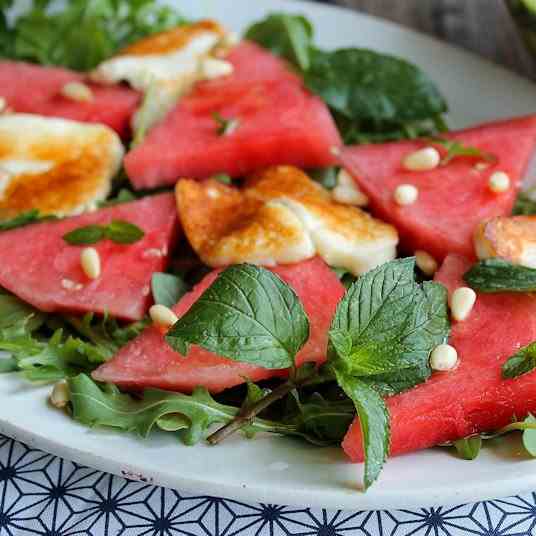 Watermelon salad with herbs and cheese