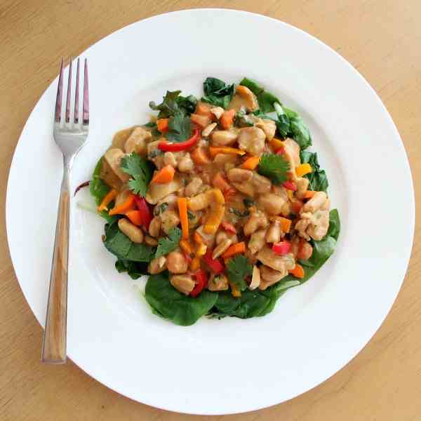 Creamy Peanut Chicken Over Greens