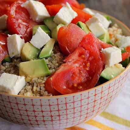 Summer salad with grains, avocado & tomato