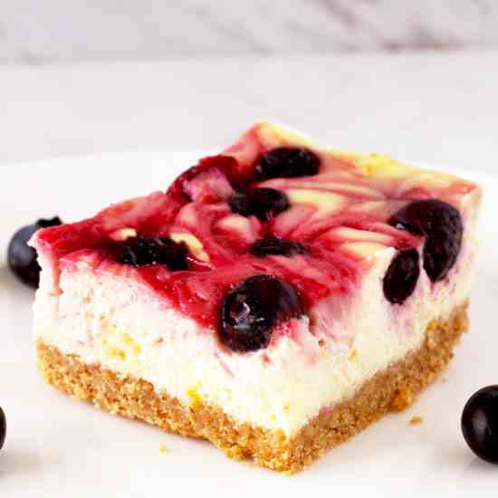 Mixed Berry Swirl Cheesecake Bars