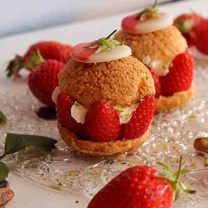 Cream puff garnished with strawberries