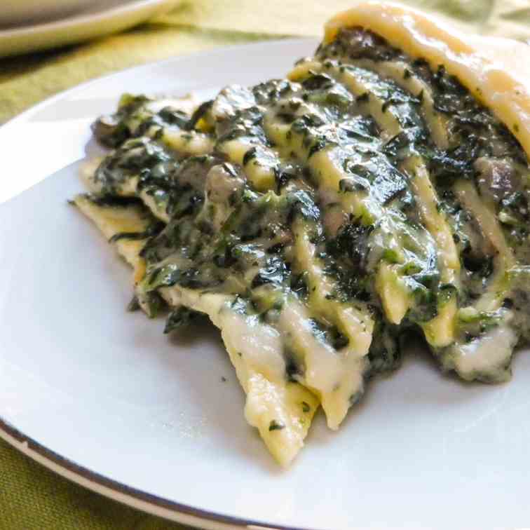 Spinach Crepe Cake w/Cheddar Sauce