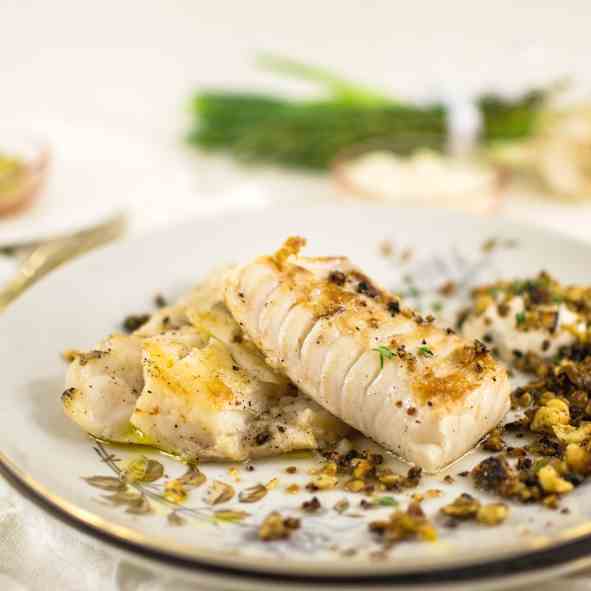 Cod fish with spicy-lime mayo and nuts