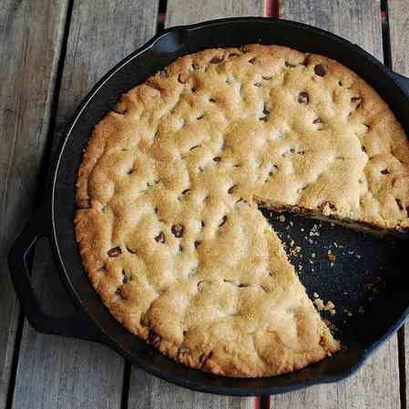 Chocolate chip cookie in a cast iron pan