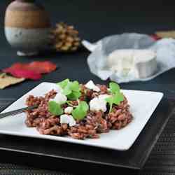 Red risotto with goat cheese and basil