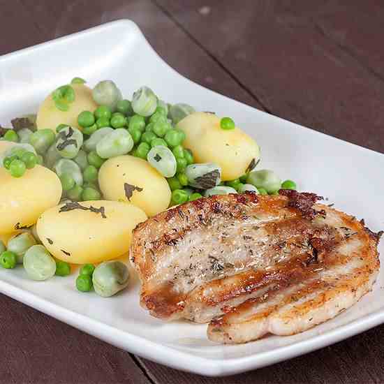 Pork belly slices and broad bean salad