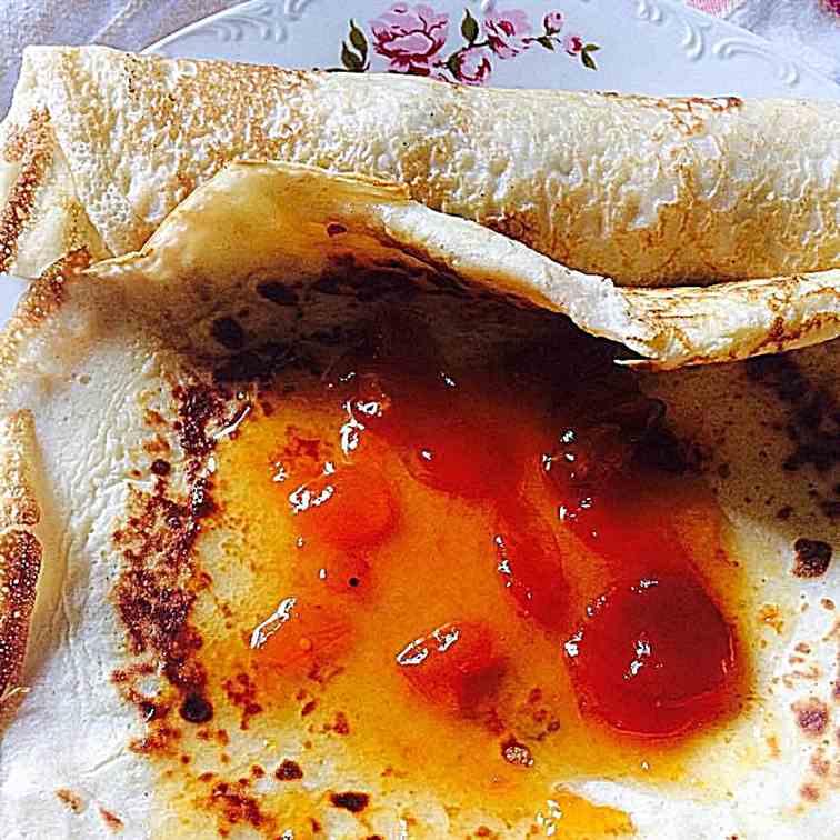 Butter pancakes with basil and mirabelles