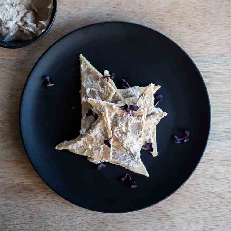 Bitter Greens Pansotti with Walnut Sauce