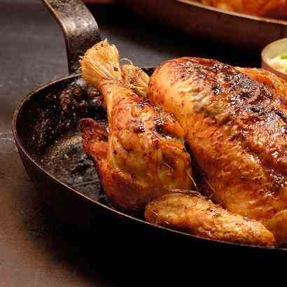 Herb roasted chicken with buttered peas