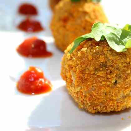 Baked veggie-stuffed arancini (rice balls)