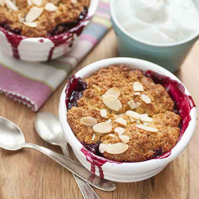 Mixed berry cobbler with honeyed yogurt