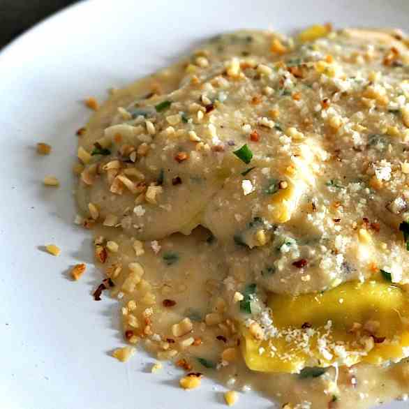 Cheese Ravioli with Parmesan and Walnut Sa