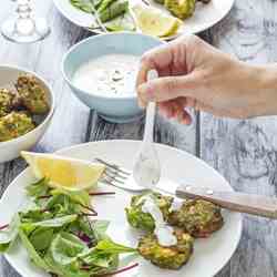 Pea fritters with yogurt mint sauce