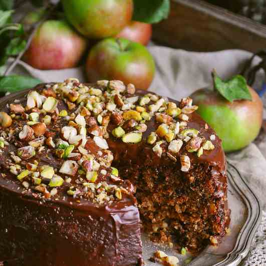 A chocolate-peanut cake with apples