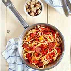 Spaghetti with pepperoni, peppers and toas