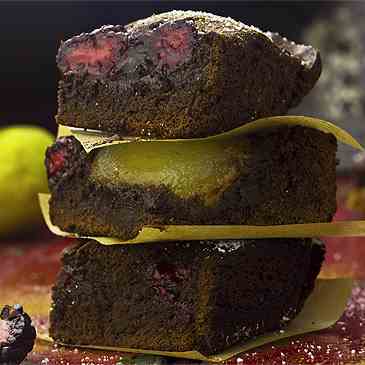 Chocolate cake with blackberries and pears