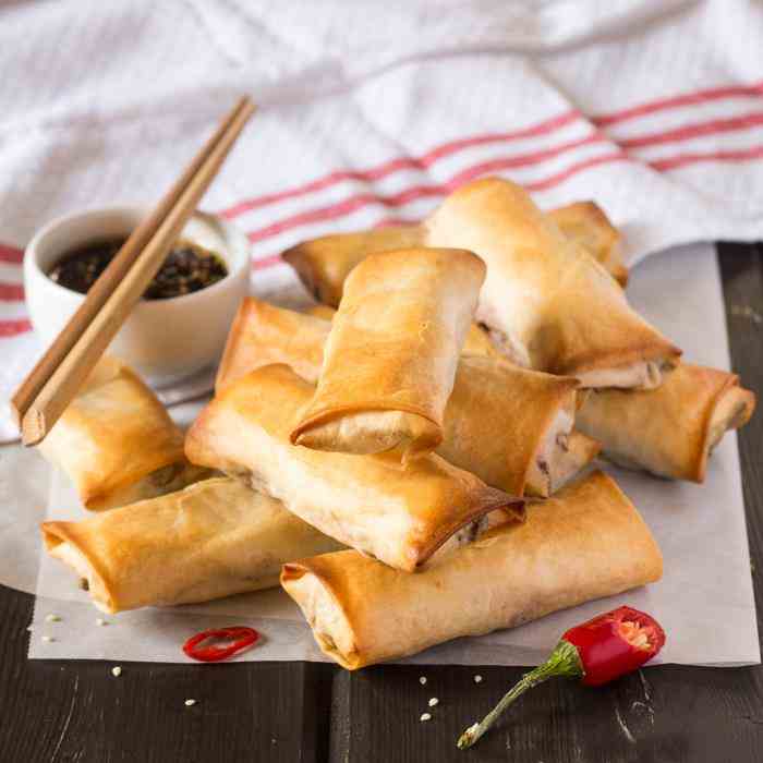 Vegan baked spring rolls with a dipping sa