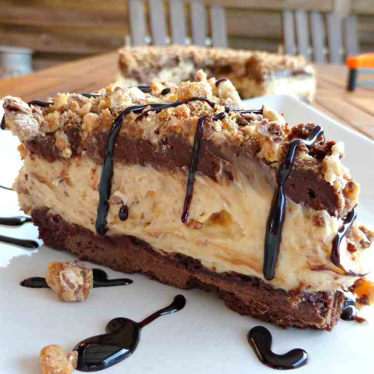 Peanut Butter and Snickers Cheesecake