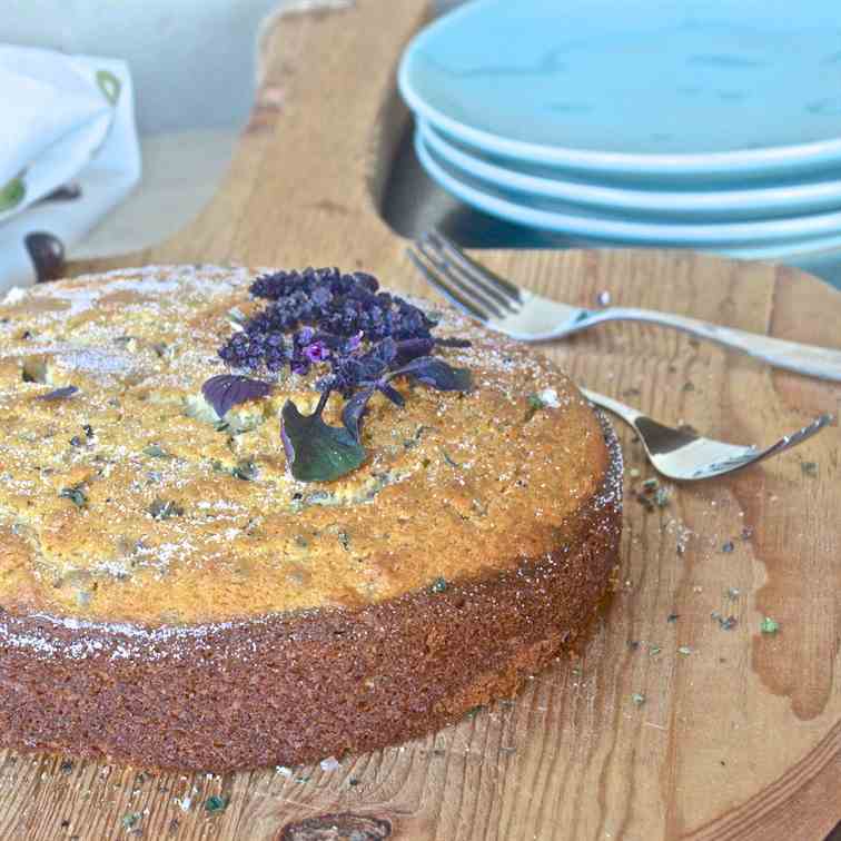 Olive oil cake with purple basil flowers