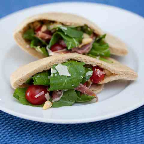 Fresh pitas with lemony arugula stuffing