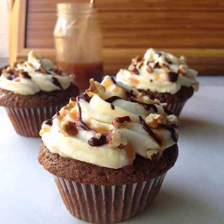 Chocolate caramel turtle cupcakes.