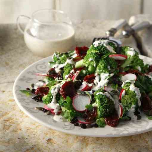 Broccoli salad with raisins, pumpkin seeds