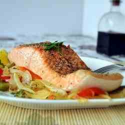 Baked salmon with peppers and onion