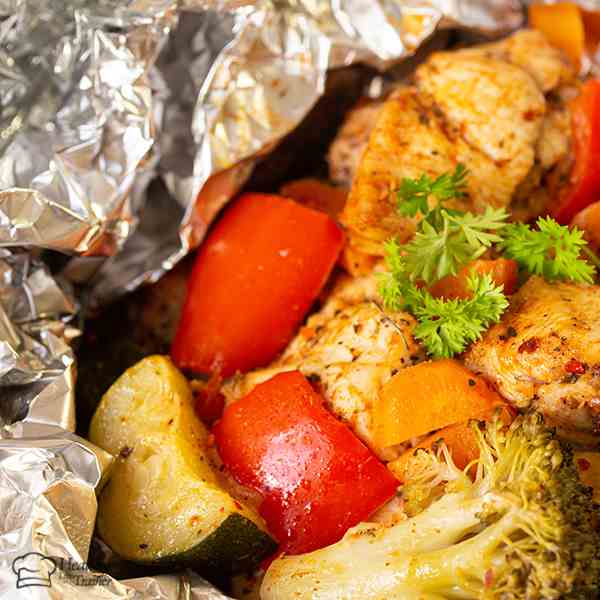 Foil Pack Cajun Chicken And Veggie Dinner 